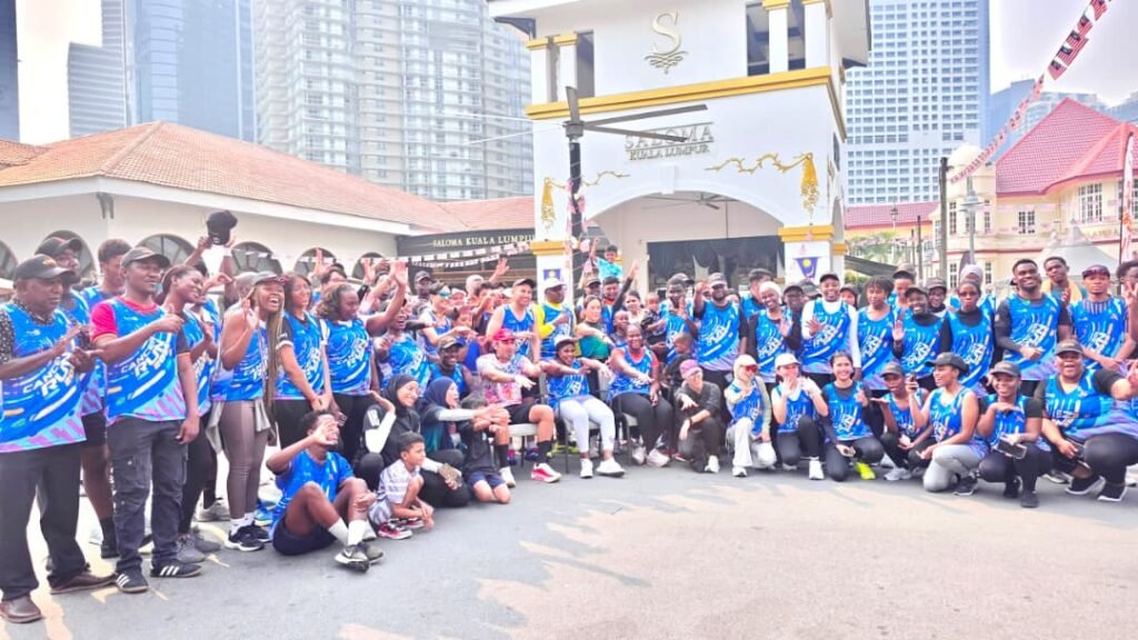 A large group of Rotary Cancer Run participants gathered outside Saloma Kuala Lumpur after the morning run
