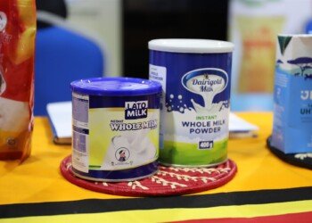 Tins of Ugandan instant whole milk powder on display at the Uganda pavilion